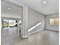 Bright dining area with tile floors and access to the Gathering room at 19366 W San Juan Ave, Litchfield Park, AZ 85340