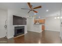 Open living room with hardwood floors and kitchen access at 5995 N 78Th St # 1108, Scottsdale, AZ 85250