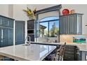 Spacious kitchen with modern cabinetry and large island at 10793 E La Junta Rd, Scottsdale, AZ 85255