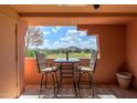 Private patio with table and chairs, mountain view at 12212 N Paradise Village S Pkwy # 451, Phoenix, AZ 85032