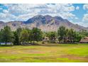 Scenic view of the golf course and mountains at 12212 N Paradise Village S Pkwy # 451, Phoenix, AZ 85032