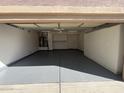 Bright and spacious two-car garage with overhead storage at 20117 N Portico Way, Surprise, AZ 85387