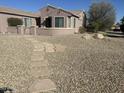 Pathway leading to the front entrance of a house at 20117 N Portico Way, Surprise, AZ 85387