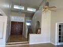 Grand entryway with high ceilings and a beautiful staircase at 2158 N Yale --, Mesa, AZ 85213