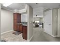 Kitchen with granite countertops and wood cabinets at 2025 E Campbell Ave # 260, Phoenix, AZ 85016