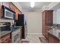 Modern kitchen with stainless steel appliances at 2025 E Campbell Ave # 260, Phoenix, AZ 85016