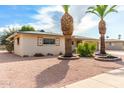 Ranch style home with landscaping and double car garage at 6019 E Casper Rd, Mesa, AZ 85205