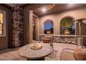 Inviting patio featuring a fire pit and comfortable seating at 5088 S Ponderosa Dr, Gilbert, AZ 85298