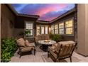 Relaxing courtyard with seating area and fire pit at 5088 S Ponderosa Dr, Gilbert, AZ 85298