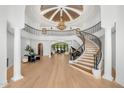 Elegant entryway featuring a grand staircase and high ceilings at 6852 E Fanfol Dr, Paradise Valley, AZ 85253