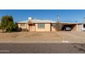 Ranch style home with carport and yard at 2954 W Townley Ave, Phoenix, AZ 85051