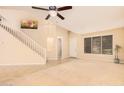 Spacious living room with high ceilings, neutral color palette, and carpeted floors at 2301 E Azalea Dr, Chandler, AZ 85286