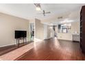 Open living room with a view into the kitchen and patio at 1601 W Sunnyside Dr # 154, Phoenix, AZ 85029