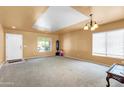 Bright living room with neutral walls and carpet at 436 N 10Th Pl, Coolidge, AZ 85128