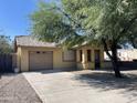 Charming single-story home with a well-maintained front yard at 1129 E Love St, Casa Grande, AZ 85122