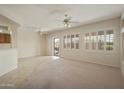 Dining area with patio access and tile flooring at 19051 N Aztec Point Dr, Surprise, AZ 85387