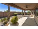 Covered patio overlooking a desert landscape at 19051 N Aztec Point Dr, Surprise, AZ 85387