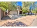 Two-story house with attached garage and landscaping at 35202 N 30Th Dr, Phoenix, AZ 85086