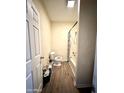 Simple bathroom with shower/tub combo and vinyl flooring at 205 N Cameron Ave, Casa Grande, AZ 85122