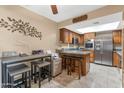 Updated kitchen with stainless steel appliances and granite countertops at 17404 N 99Th Ave # 108, Sun City, AZ 85373