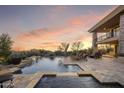 Resort-style pool and spa with lounge chairs at 36389 N 105Th Pl, Scottsdale, AZ 85262