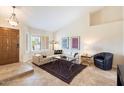 Bright and airy living room with a cozy seating area at 8894 E Sheena Dr, Scottsdale, AZ 85260