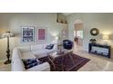 Open and inviting living room with vaulted ceilings at 8894 E Sheena Dr, Scottsdale, AZ 85260