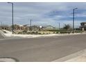 Community park with playground and basketball court at 15935 W Montana De Oro Dr, Surprise, AZ 85387