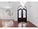 Elegant entryway with double doors and hardwood floors at 580 N Benson Ln, Chandler, AZ 85224