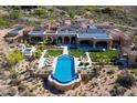 Luxury estate with solar panels, expansive grounds, and a stunning pool at 11179 E Honda Bow Rd, Scottsdale, AZ 85262
