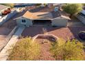 Single story home with a large yard and attached garage at 5534 W Tierra Buena Ln, Glendale, AZ 85306