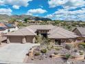 Aerial view of luxury home and surrounding area at 42023 N Bridlewood Way, Phoenix, AZ 85086