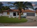 Single story home with a renovated exterior and landscaped yard at 8320 E Appaloosa Trl, Scottsdale, AZ 85258