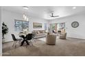 Open living and dining area with patio access at 16308 E Arrow Dr # 111, Fountain Hills, AZ 85268