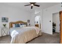 Main bedroom with cozy bedding and ensuite bath at 16308 E Arrow Dr # 111, Fountain Hills, AZ 85268