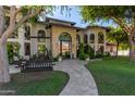 Beautiful home with a stone facade and a large, inviting front entry at 14828 N 15Th Ave, Phoenix, AZ 85023