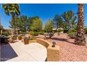 Covered patio with seating area overlooking a desert landscape at 15746 W Amelia Dr, Goodyear, AZ 85395