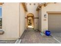 Brick walkway leading to front door of home with garage at 21487 E Arroyo Verde Dr, Queen Creek, AZ 85142