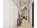 Elegant hallway with hardwood floors and modern lighting fixtures at 2136 E Paradise Ln, Phoenix, AZ 85022