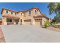 Two-story house with large driveway and desert landscaping at 40752 W Robbins Dr, Maricopa, AZ 85138