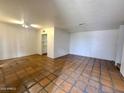 Large living room with tile floors and open floor plan at 3416 N 44Th St # 5, Phoenix, AZ 85018