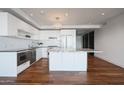 Modern white kitchen with granite countertops at 4422 N 75Th St # 4011, Scottsdale, AZ 85251