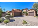 Tuscan style home with double garage and gated entry at 17808 N 57Th Pl, Scottsdale, AZ 85254