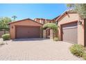 Elegant home with double garage and paved driveway at 17808 N 57Th Pl, Scottsdale, AZ 85254