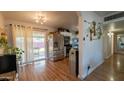 Bright kitchen features stainless steel appliances and white shaker cabinets at 2047 W Maryland Ave, Phoenix, AZ 85015
