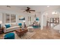 Bright living room with tiled floor, comfy furniture and high ceilings at 944 S Grand --, Mesa, AZ 85210