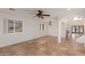 Open living area with tiled floors and a neutral color scheme at 944 S Grand --, Mesa, AZ 85210