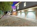 Modern home with three-car garage and paved driveway at 341 E Monte Vista Rd, Phoenix, AZ 85004