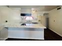 Bright kitchen with white cabinets and marble countertops at 2814 N 55Th Ave, Phoenix, AZ 85035