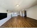 Spacious living room with dark wood flooring at 2814 N 55Th Ave, Phoenix, AZ 85035